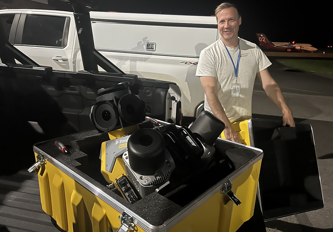 Dave Simms, Morrison-Maierle project lead, poses with the LiDAR equipment.