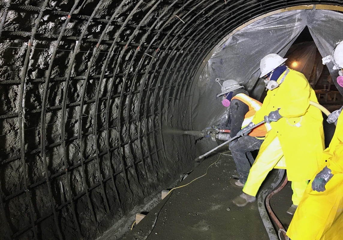 The team inside the outlet pipe. 