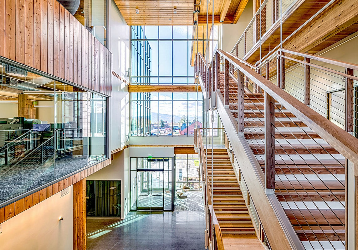 The entryway highlights many mass timber uses. 