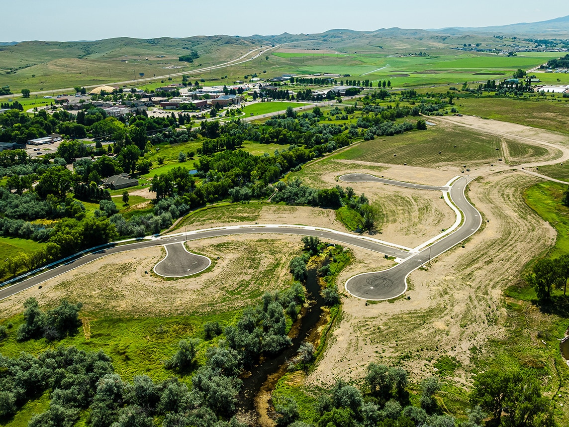 The combination of flat grades and close proximity to wetlands impacted the design. 