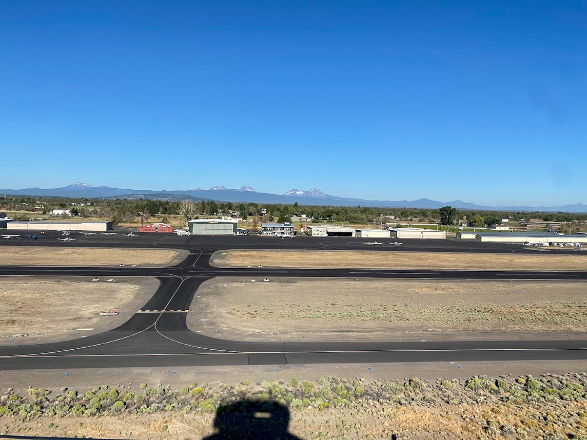 In addition to the tower, the project included a paved service road, parking area, utilities, security fencing, and weather sensors.  