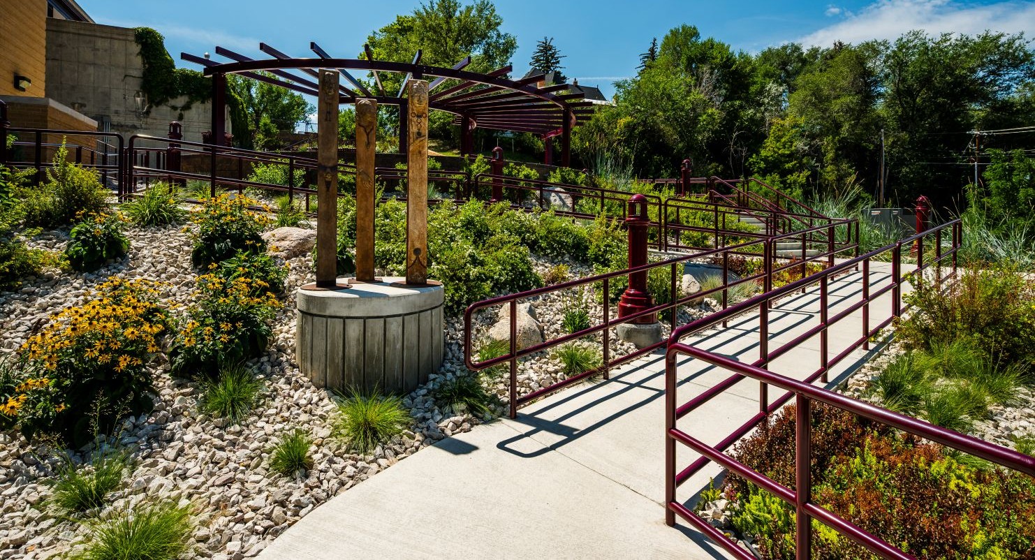 Finished Green Space showing the pathways, plantings, retaining walls and site features.